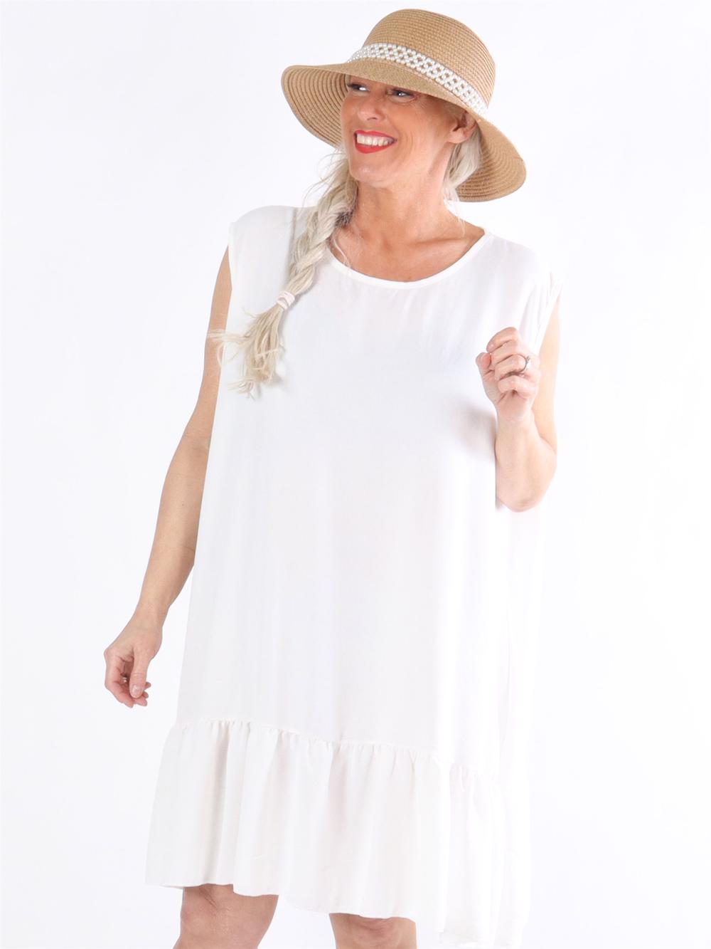 Manola - Kjole i løs pasform med flæsekant forneden